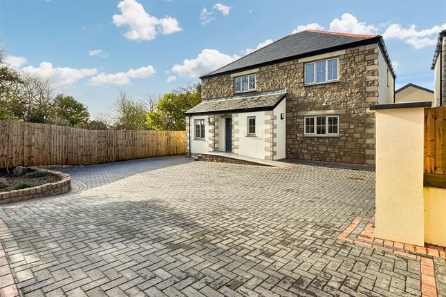 4 bed detached house