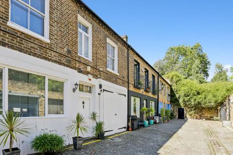 Russell Gardens Mews, London W14 5 bed mews for sale